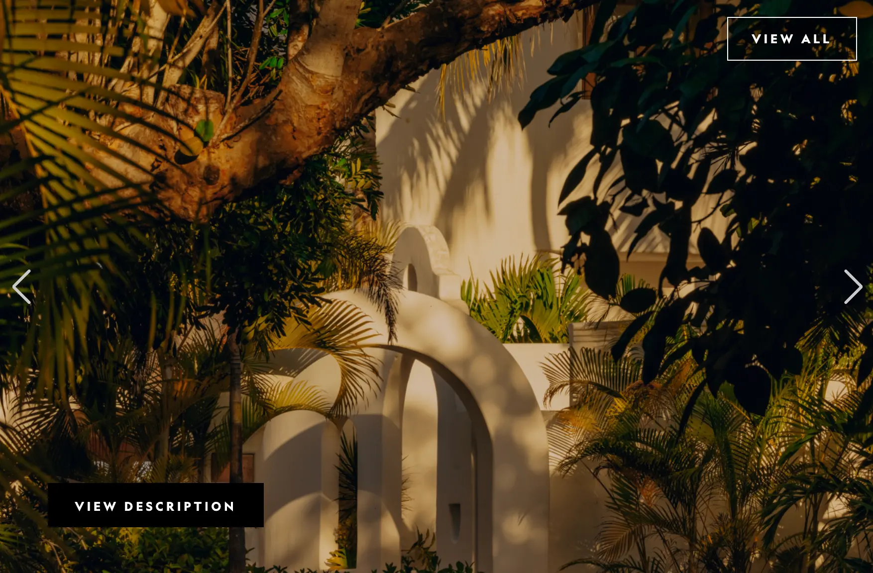 Arched whitewashed architecture amid the jungle at Maroma
