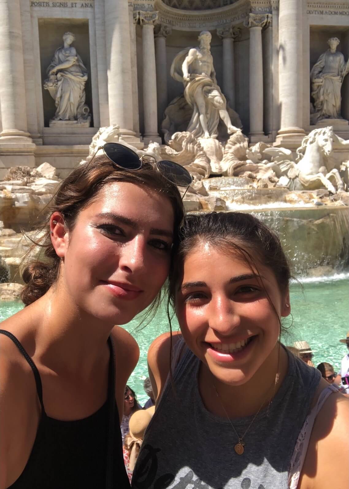 tourists at the trevi fountain in rome italy